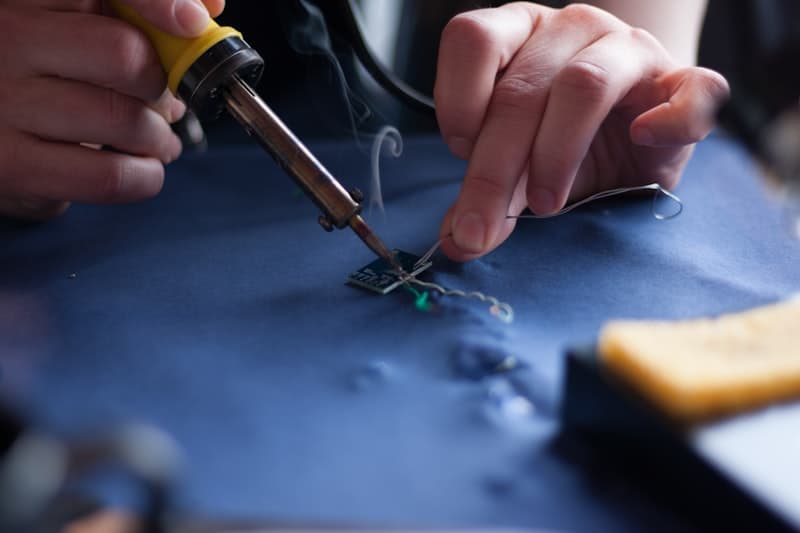 Hands micro soldering hardware circuit